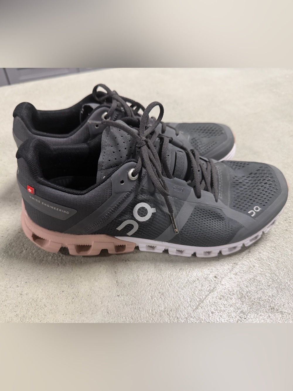 On Cloudflow Women's Running Shoes in Black with Pink Midsole